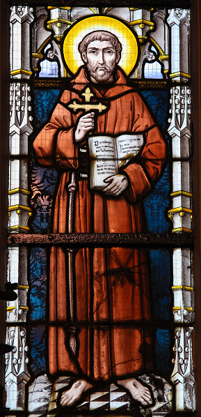 Stained glass window depicting Saint Francis of Assisi in the Church of Stabroek, Belgium.