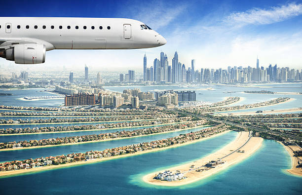 istock private jet over the palm jumeirah 483057008