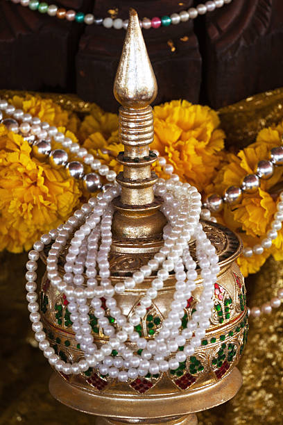 istock Buddhist shrine with mali flowers and pearls 483057064