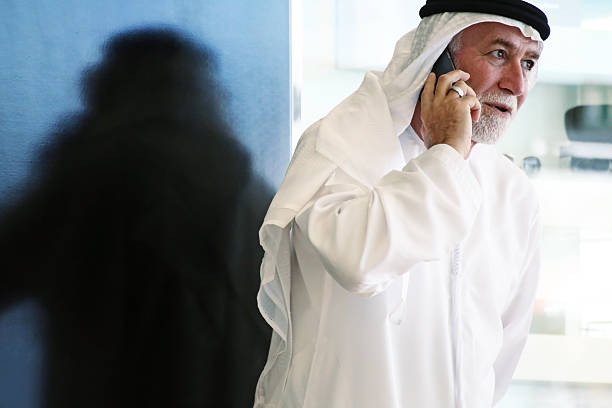 Arabian man talking on phone