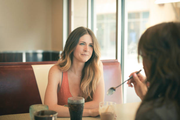 istock Two women sitting in cafe 483057402