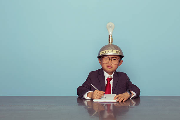 Confused Japanese Business Boy Wearing Thinking Cap
