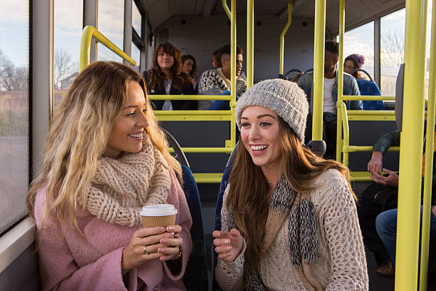 istock Two women chatting on a bus 483060818