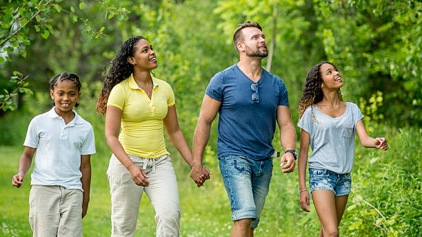 istock Family Walk through the Park 483060820