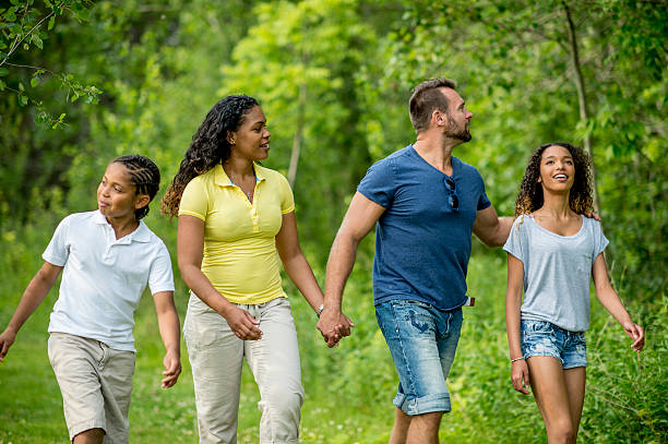 istock Family Walk through the Park 483060822
