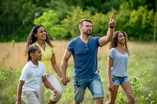istock Family Walk through the Park 483060824