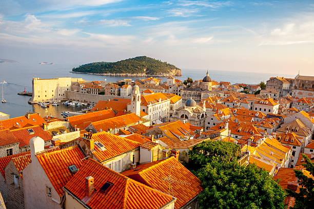 Sunset Over Dubrovnik Old Town Orange roof tiles from Dubrovnik Old Town dubrovnik stock pictures, royalty-free photos & images