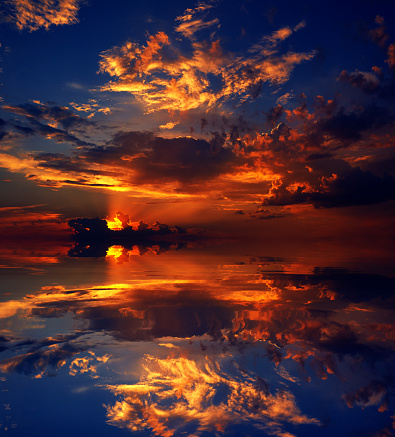 nature amazing scenes, sunset over sea with water reflection.