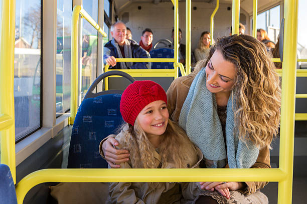 istock Mother and daughter on the bus 483067336