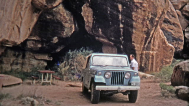 1971: Devils Kitchen campsite proves to be a scenic place for lunch for a Jeep driver.