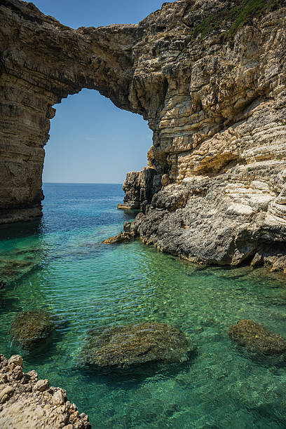 istock Unique and scenic arch in the cliffs, Paxi, Greece 483069842