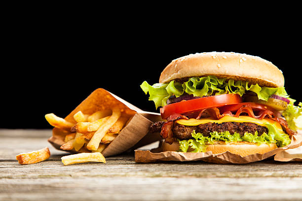 istock Delicious hamburger and fries 483069976