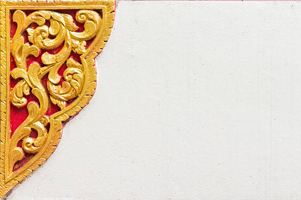 Thai style molding art on the white wall