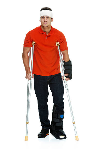 istock Injured man standing with crutches 483073567
