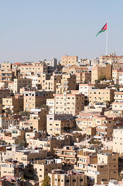 istock Apartments and flag in Amman Jordan 483073671