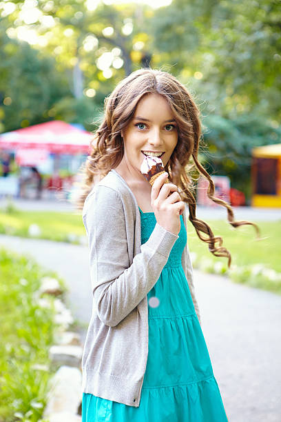 istock Young woman with ice cream. 483074679