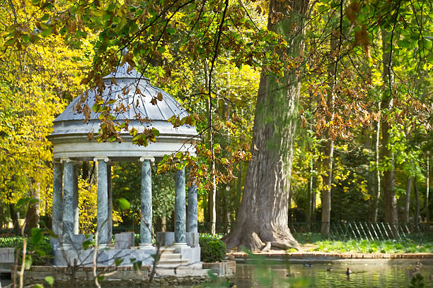 istock fall in a lake with marble temple 483075311