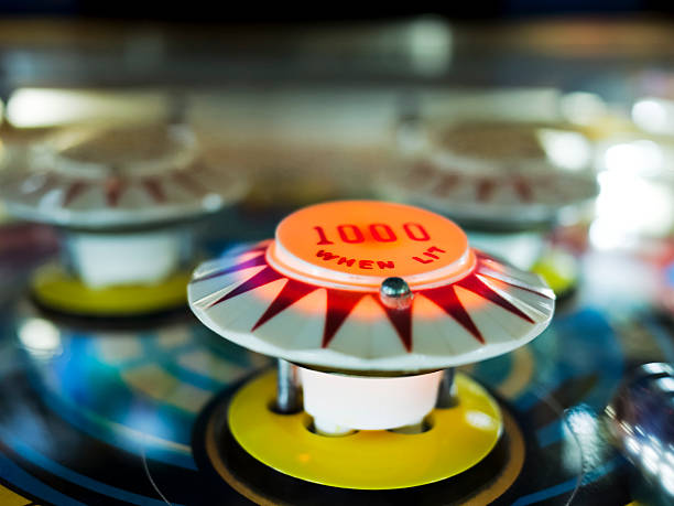 istock Antique Pinball Machine with Ball in motion 483078221