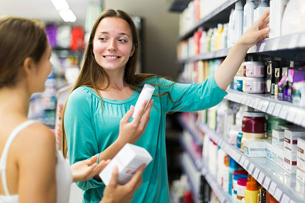 istock Woman selecting cosmetical cream 483083012