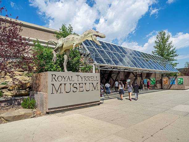 Royal Tyrrell Museum Drumheller, Canada - July 4,2015: Entrance to the Tyrrell Museum Drumheller. The museum is a popular Canadian Tourist attraction and leading centre of Palaeontology Research. drumheller valley stock pictures, royalty-free photos & images