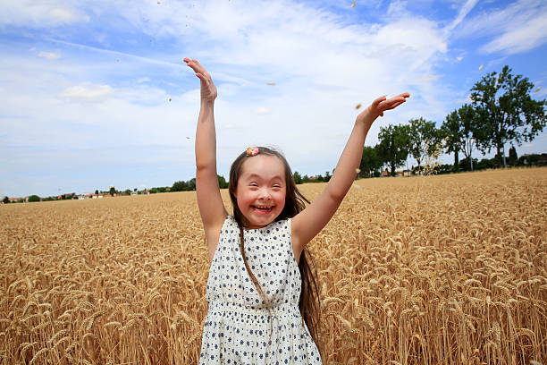 istock Young girl have fun in wheat field 483088712