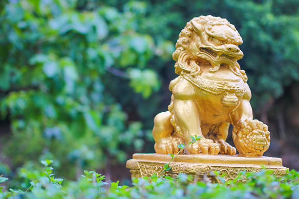 istock Gold lion statue in the garden 483088728