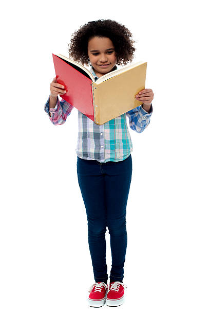 istock Little girl a reading book 483092076