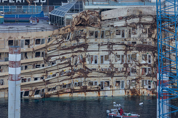 Giglio Island, Italy - October 17, 2013: The damaged area of the wreck of Costa Concordia after Parbuckling, a project that has made possible the rotation of the ship after the sinking in Giglio Island.