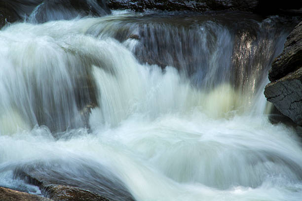 istock Small waterfall, whitewater and rocks, Sugar River, Newport, New 483093890