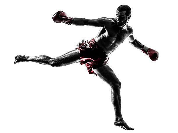 istock one man exercising thai boxing silhouette 483093987