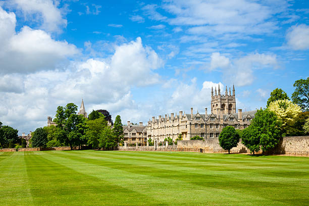 Cambridge, England, UK, July 2022: Clare college buildings on the River Cam through the centre of Cambridge on a bright sunny summer's day.