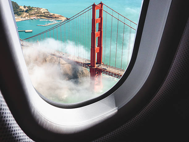 veduta aerea di san francisco golden gate bridge - window porthole sky cloudscape foto e immagini stock