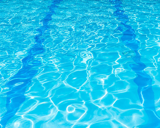 istock Background of rippled pattern of clean water in a blue. 483099102