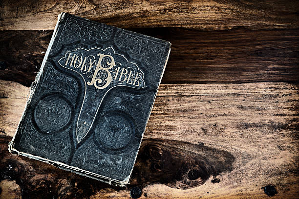 istock Antique Family Bible on Rustic Table 483099457