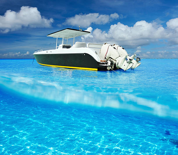 istock Beach and motor boat with white sand bottom underwater view 483099619