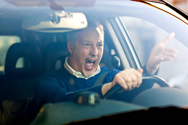 Angry driver Angry driver shouting in his car stressed man funny stock pictures, royalty-free photos & images