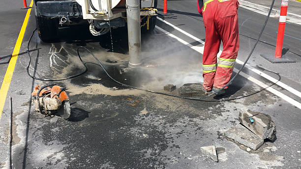 ハイドロ excavation 作業を road - borehole ストックフォトと画像