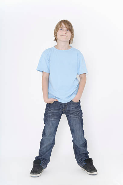 istock Ebenhausen,boy standing against white background 483107172