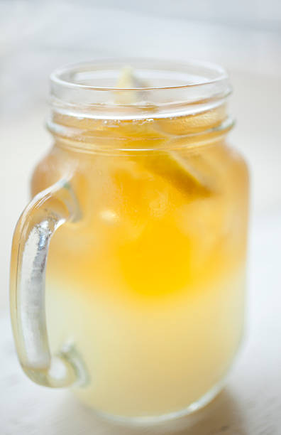 Ice tea on a table by the window in the morning