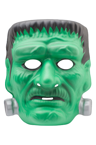 A Halloween Frankenstein mask, isolated on a pure white background. There was no copyright information anywhere on the product or on the tag. The mask is made of a thin textured foam material. 