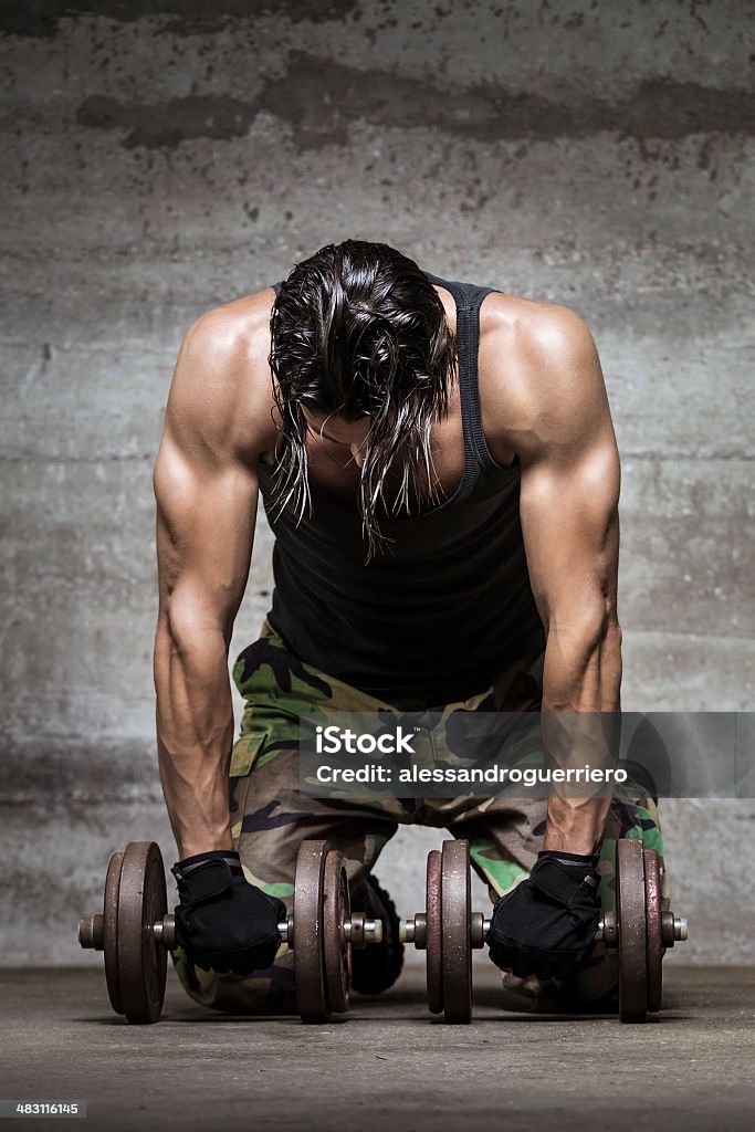 Athlète de la fatigue musculaire - Photo de Activité libre de droits