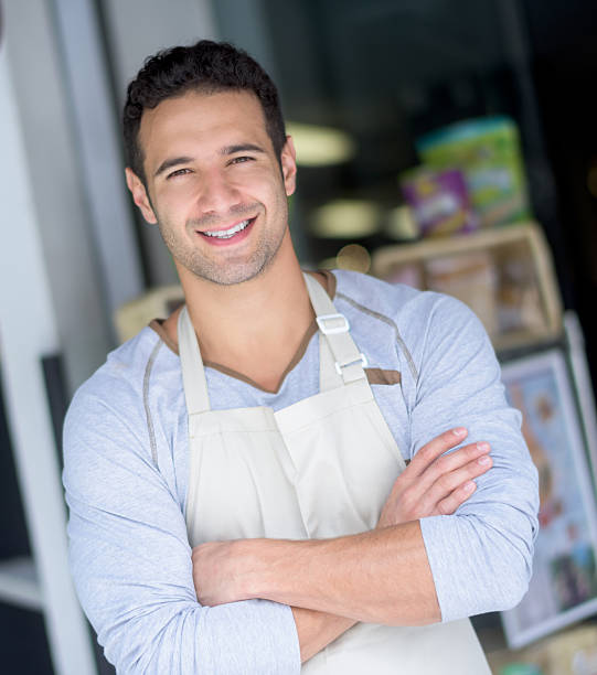istock Man working at a food market 483116980