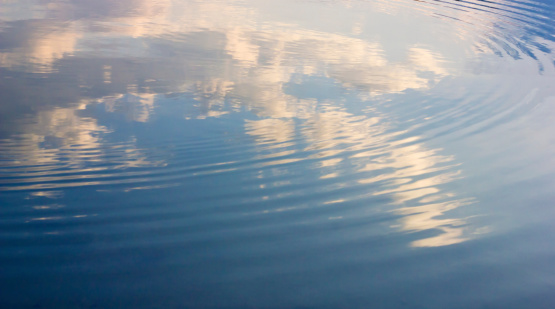 clouds reflects from water surface