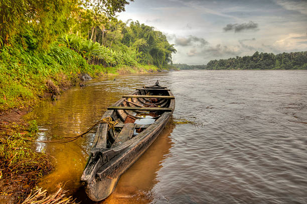 istock Boat on a grassy river bank 483117129