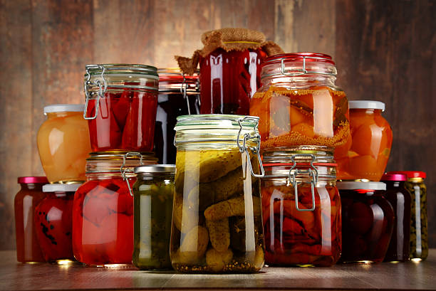 istock Jars with pickled vegetables and fruity compotes 483117310