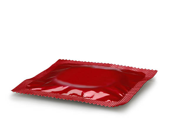 istock Red condom isolated on white, Clipping Path 483117692
