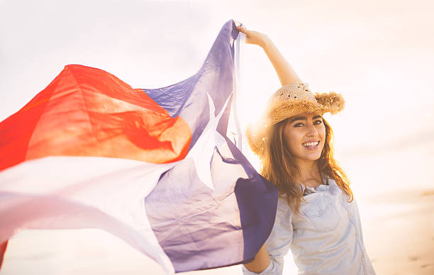 Woman with Texan flag waving in the wind