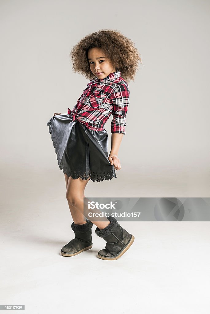 african child A happy little multi-racial girl with a beautiful face stands close to camera. Child Stock Photo