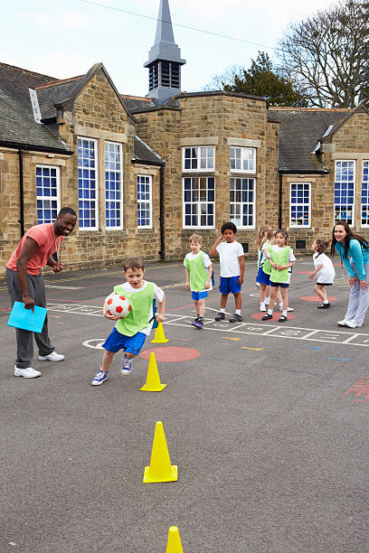 istock Group Of Children In School Physical Education Class 483118276