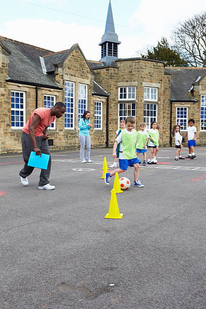 istock Group Of Children In School Physical Education Class 483118280